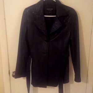 Rampage woman's black leather jacket. Tie waist. Slightly worn.